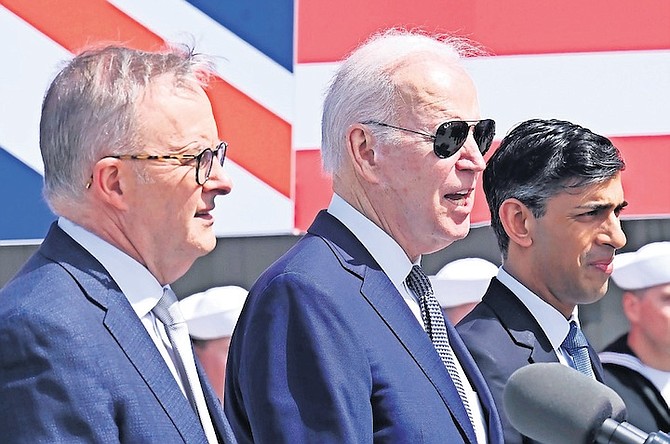 BRITAIN’s Prime Minister Rishi Sunak, right, meets with US President Joe Biden and Prime Minister of Australia Anthony Albanese, left, at Point Loma naval base in San Diego, US, Monday March 13, 2023, as part of AUKUS, a trilateral security pact between Australia, the UK, and the US. Photo: Leon Neal/AP