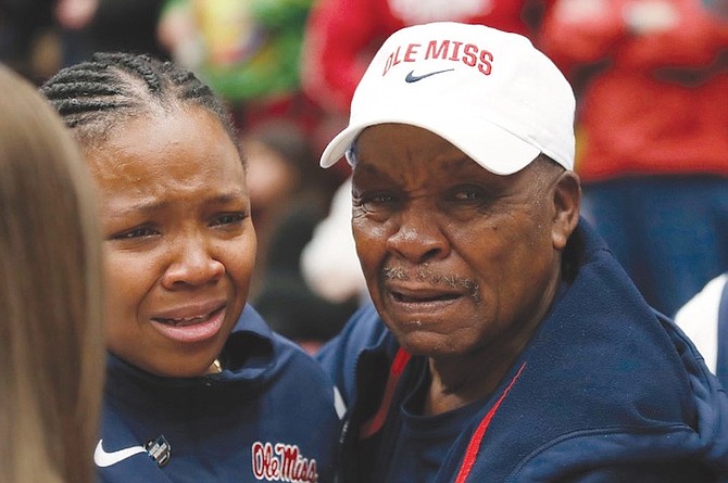 MISSISSIPPI head coach Yolett McPhee-McCuin gets emotional with her dad Gladstone McPhee, right, after winning against Stanford during the second half of a second-round college basketball game in the women’s NCAA Tournament on Sunday, March 19, 2023, in Stanford, California. 
(AP Photo/Josie Lepe)