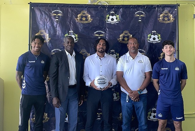 SHOWN, from left to right, are men’s national soccer team player Omari Bain, Bruce Swan, BFA technical director, Adam Miller, sports officer, Kevin Davies, assistant coach, and men’s national team player Nicolas Lopez.