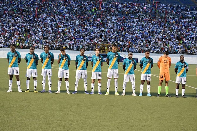 TEAM EFFORT: Members of the Bahamas men’s senior national soccer team pose together.
