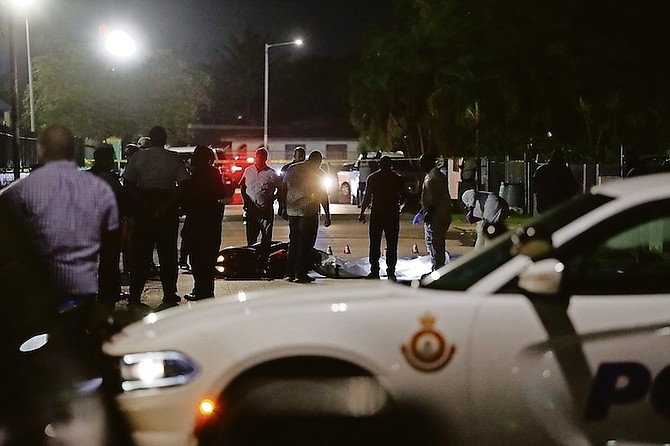 Police at the scene of the shooting. Photos: Austin Fernander
