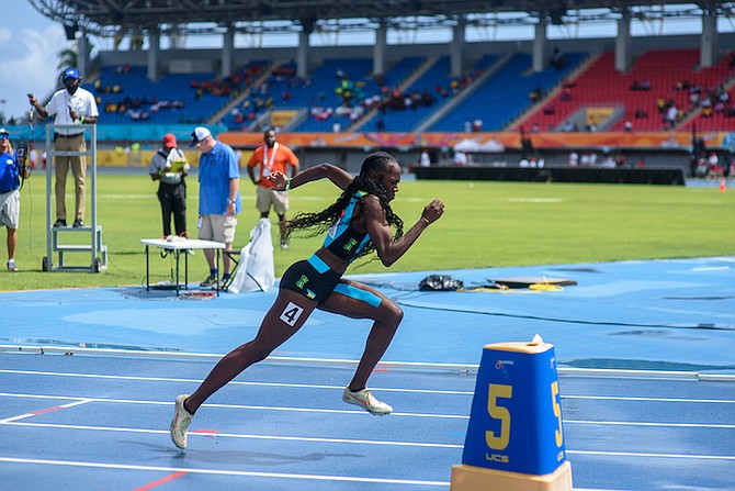 Javonya Valcourt competes in the heats of the 400 metres during the 50th CARIFTA Games at Thomas A Robinson National Stadium over the weekend.
Photo: Moises Amisial/Tribune Staff