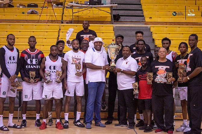 WE ARE THE CHAMPIONS: The Bahamas Basketball Federation Division 1 champions, Commonwealth Bank Giants, with their hardware.