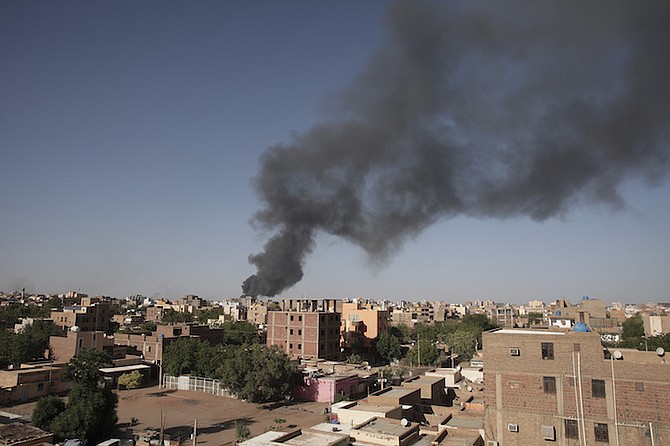 Smoke is seen in Khartoum, Sudan, Wednesday. Terrified Sudanese are fleeing their homes in the capital Khartoum, witnesses say, after an internationally brokered cease-fire failed and rival forces battled in the capital for a fifth day.
Photo: Marwan Ali/AP