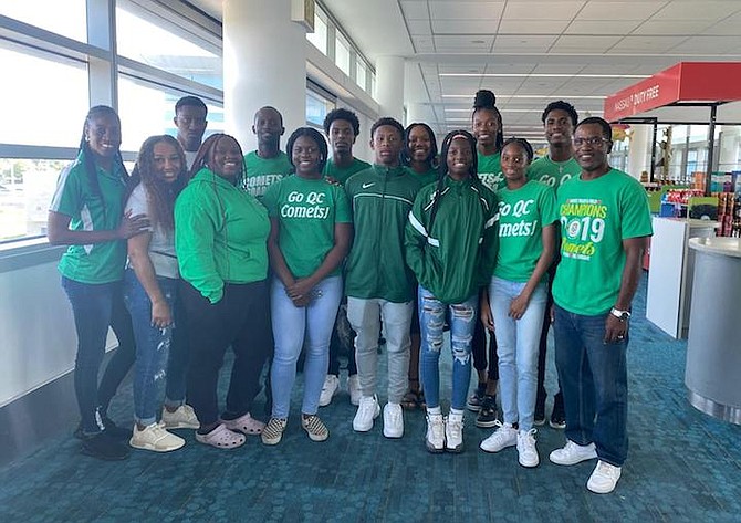 GOING FOR THE GOLD: Queen’s College Comets athletes prepare to leave for the Penn Relays in Philadelphia this weekend.