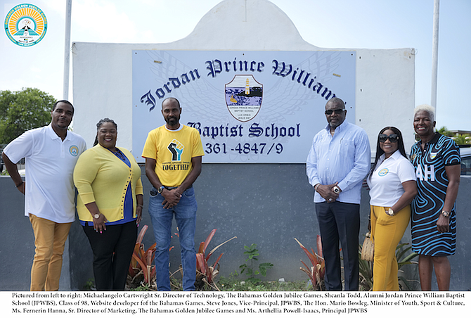 Minister of Youth, Sports and Culture Mario Bowleg, third from right, can be seen during his visit to Jordan Prince Williams Baptist School.