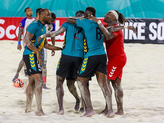 TWO STRAIGHT WINS: Team Bahamas players celebrate last night after defeating Belize 6-2 on day two of the CONCACAF Beach Soccer Championship and World Cup Qualifier in the national beach soccer stadium.
Photo by Austin Fernander/Tribune Staff