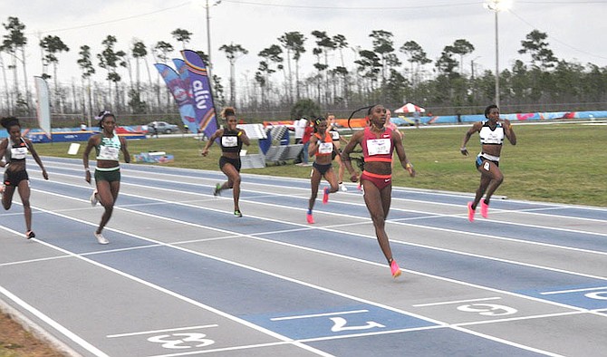 CRUISE CONTROL: Anthonique Strachan wins the women’s 200 metre finals at the NACAC New Life Invitational in the nation’s second city of Freeport, Grand Bahama.                 
Photos by Vandyke Hepburn/BIS
