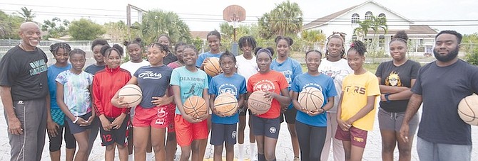 MISSING YOU: Coach Terrance ‘Red-Eye’ McSweeney and his Diamond Basketball development programme for girls hosted a basketball clinic in memory of the late Jonique ‘Mini’ Webb at the Charles W Saunders High School on Saturday. 
Photo: Moises Amisial/Tribune Staff