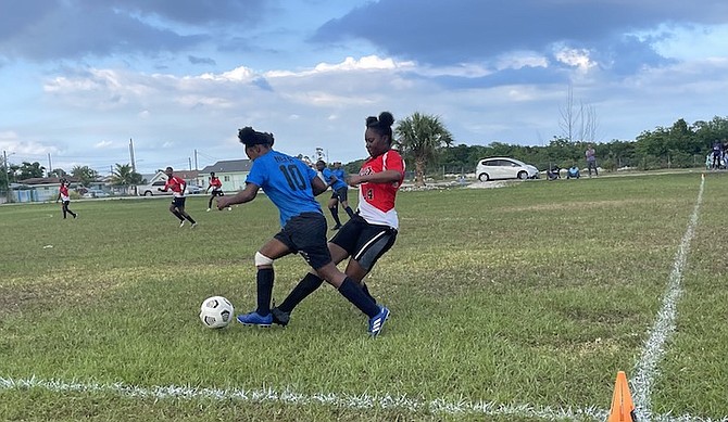 DEFENCE FIRST: The second-seeded Anatol Rodgers Timberwolves faced off against third-seeded RM Bailey Pacers yesterday during the GSSSA soccer sudden death playoffs.                                                                                      Photo: Tenajh Sweeting
