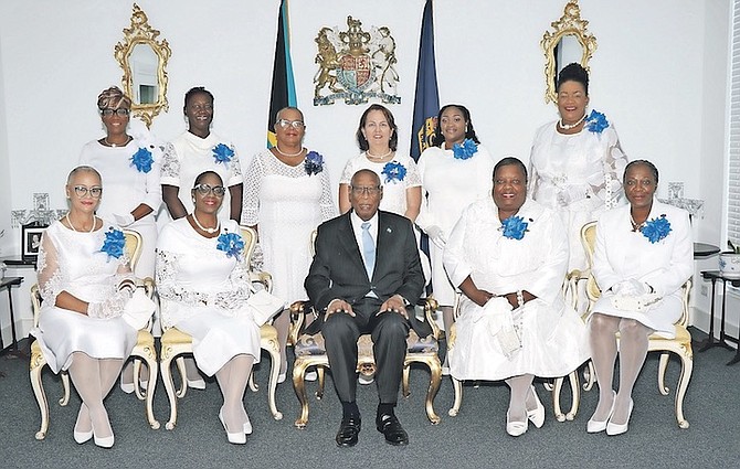 From left, seated: Helen Ingraham, ACW council treasurer, Charlene Rodgers, ACW council president, Sir Cornelius A Smith, Governor General, Andreae Francis, ACW council vice president, Deborah McKinney, ACW council secretary. Standing: Kimley Dean, ACW council social outreach chair, Brendalee Strachan, ACW council chaplain, Janice Weech, ACW council assistant treasurer, Sandra Burrows, East Central Archdeaconry coordinator, Dalette Walkes, ACW council public relations chair and Elsie Strachan, ACW council fundraising chairperson.