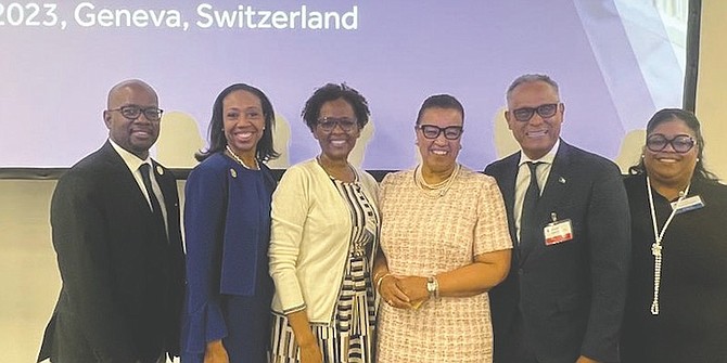 HEALTH Minister Dr Michael Darville, second from right, in Switzerland.
