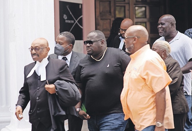 ADRIAN Gibson pictured outside court previously alongside his attorney Murrio Ducille.