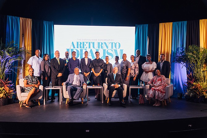 Sir Franklyn Wilson, (centre, left) and Sean McWeeney, KC, (centre, right) seated with their wives (Mrs Sharon Wilson, former President of the Senate and Mrs Cyprianna McWeeney, former Miss Bahamas and businesswoman) with members of the National Independence Secretariat and the Antiquities, Monuments and Museums Corporation standing behind them.