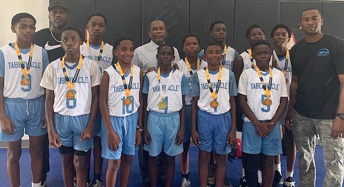 Tabernacle Baptist Falcons show off their medals.