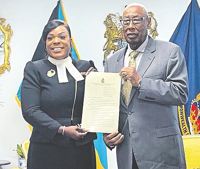Cordell Frazier being sworn in by Governor General CA Smith as Acting Director of Public Prosecutions. Opposition leader Michael Pintard is calling for Ms Frazier to be confirmed as the Director of Public Prosecutions.