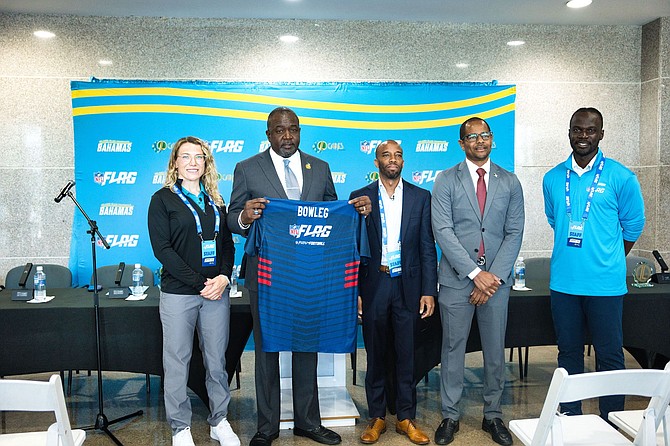 Members of the National Football League (NFL) Flag gifted Minister of Youth, Sports and Culture Mario Bowleg with the first official flag football jersey following the announcement of The Bahamas as the first Caribbean country to join NFL Flag.