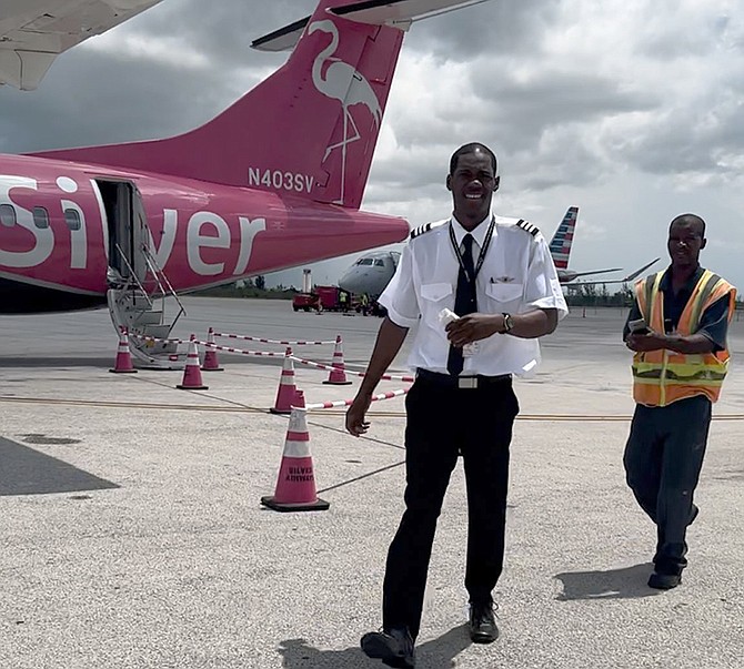 ROBERT Clarke Jr, a 29-year-old Grand Bahamian pilot with Silver Airways, receives a warm Bahamian welcome after making his inaugural flight to The Bahamas on May 28.