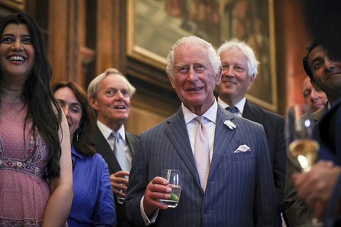 Britain’s King Charles III meets with guests during a reception for the inaugural Queen’s Reading Room Literary Festival at Hampton Court Palace, London, Sunday June 11, 2023. Photo: Adrian Dennis/AP