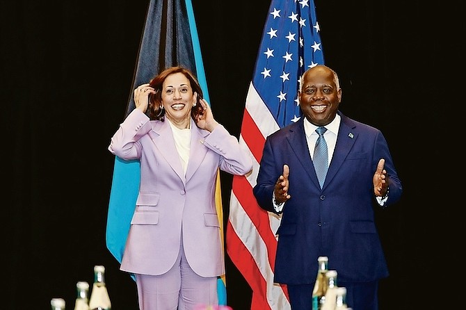 US Vice President Kamala Harris and Prime Minister Philip ‘Brave’ Davis in a relaxed moment as they prepare to pose for a picture together.
Photo: Austin Fernander