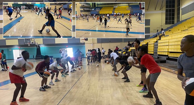 RAINING BUCKETS: Over 200 girls and boys combined gathered at the Kendal G L Isaacs Gymnasium yesterday to learn basketball fundamentals courtesy of the Basketball Smiles summer camp.
Photos by Tenajh Sweeting