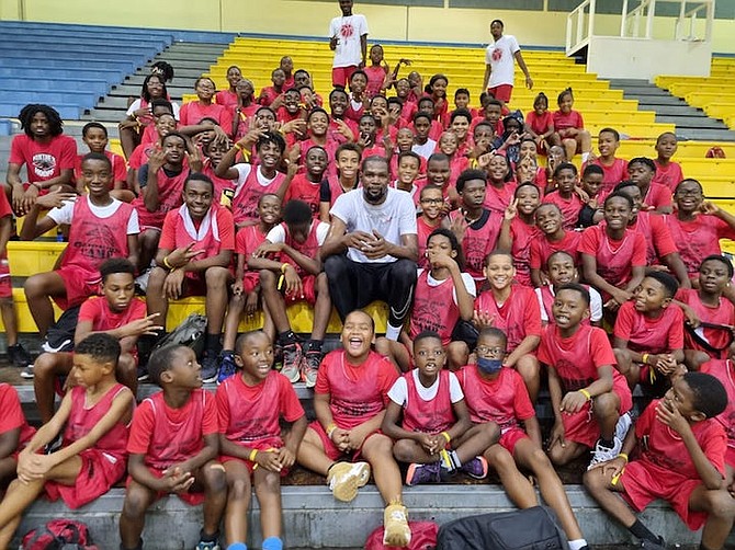 CELEBRITY APPEARANCE: NBA superstar Kevin Durant, of the Phoenix Suns, at the Elite Skills Basketball Camp at Kendal G L Isaacs Gymnasium yesterday.