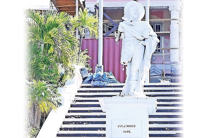 FROM 2021: The Columbus statue at Government House with an arm and a leg missing after being attacked with a sledgehammer. 