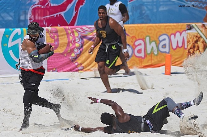 SAND WARS: Flag football teams battle on the sand during last year’s Sand Wars Bahamas flag football tournament.
