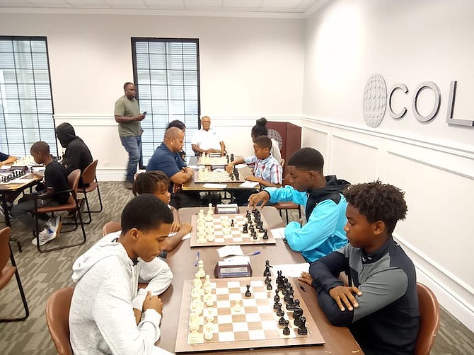 CHESS players clash during the Warren Seymour Chess Classic - an open tournament at which junior and senior players square off against each other.