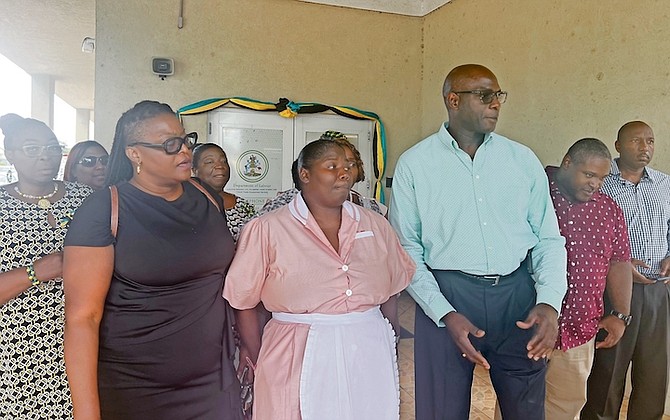 Members of the Bahamas Hotel, Catering and Allied Workers Union stood in solidarity with an Atlantis chief shop steward, who was terminated for “insubordination” and “inciting work stoppage”, after a clean record on the job for 24 years. 
Pictured in front in photo: President of Human Rights Bahamas and BHCAWU Union member Princess Adderley, Chief shop steward for Royal Towers Housekeeping Stephanie St Fleur, and Darrin Woods, President of BHCAWU.
Photo: Letre Sweeting