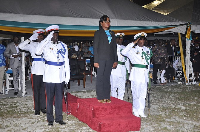Minister for Grand Bahama Ginger Moxey inspected the guard. Photos: Vandyke Hepburn