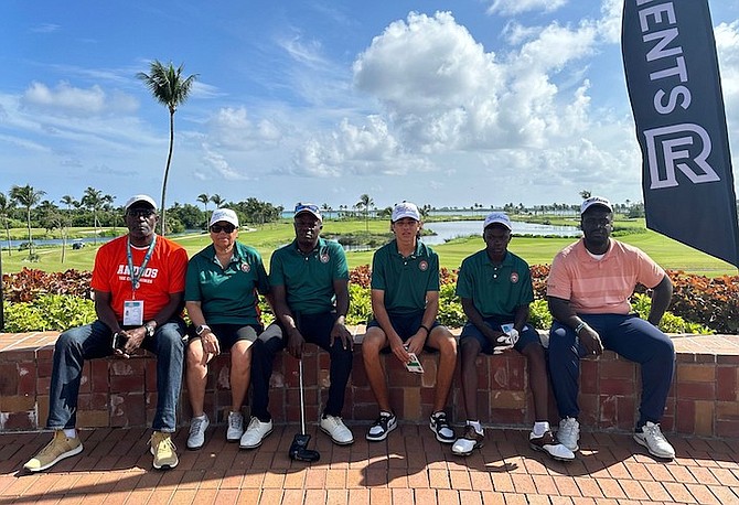 Andros Sports Council chairman Brian Clear hanging out with the Chickcharnies’ golf team at the Ocean Club on Paradise Island.