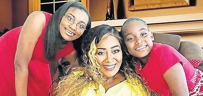 VANESSA Clarke with her two daughters, V’ajha and V’lori.