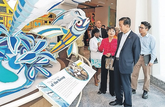 XIAO JIE, vice-chairman of the National People’s Congress of the People’s Republic of China, accompanied by China’s Ambassador to The Bahamas Dai Qingli during a tour of the Junkanoo Museum at the Nassau Cruise Port. Photo: Anthon Thompson/BIS