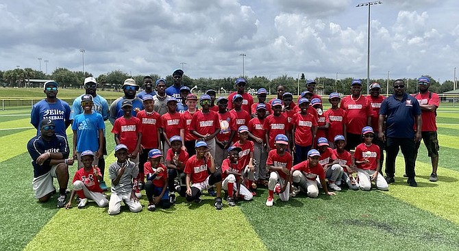 TEAM EFFORT: International Elite Sports Academy members combine with the Reloaded Baseball team at Northeast Regional Park, Polk County in their last practice before Saturday’s tourney.