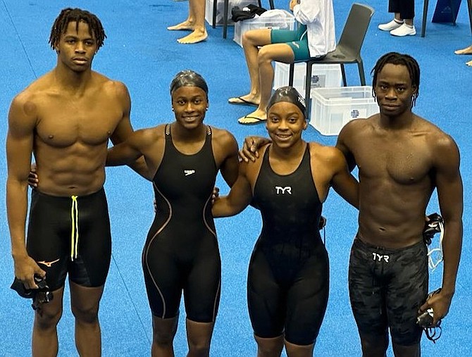 THE Bahamas’ swim team, from left to right, Lamar Taylor, Rhanishka Gibbs, Zaylie-Elizabeth Thompson and Davante Carey at the FINA World Aquatics Championships in Fukuoka, Japan.