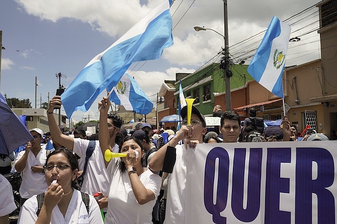PROTESTORS gather outside the Attorney General’s Office in Guatemala City, Monday, July 24,
2023. Demonstrators are demanding respect for democracy after prosecutorial and judicial actions
against the Supreme Electoral Tribunal and against one of the two parties set to participate in the
presidential run-off election. Photo: Moises Castillo/AP