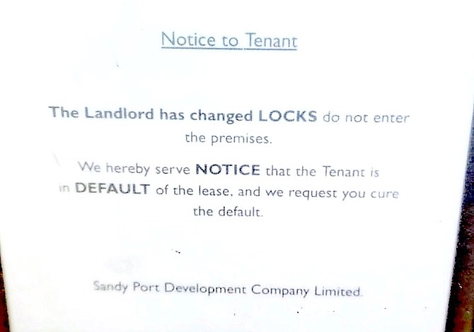 EVICTION notice posted outside Arawak X office.