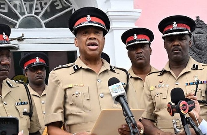 Commissioner of Police Clayton Fernander reads the announcement that Parliament will be prorogued until October 4 outside the House of Assembly on Saturday.
Photo: Kemuel Stubbs/BIS