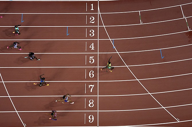 Anthonique Strachan (top in lane three) competes in the Women's 200-metres final during the World Athletics Championships in Budapest, Hungary, Friday. (AP Photo/David J. Phillip)