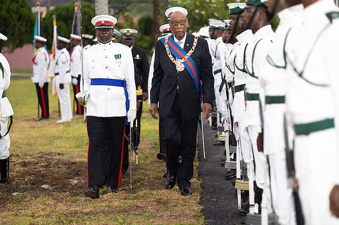 OUTGOING Governor General Cornelius A Smith performed a final inspection of RBDF officers during his demitting office ceremony last night. Photo: Moise Amisial