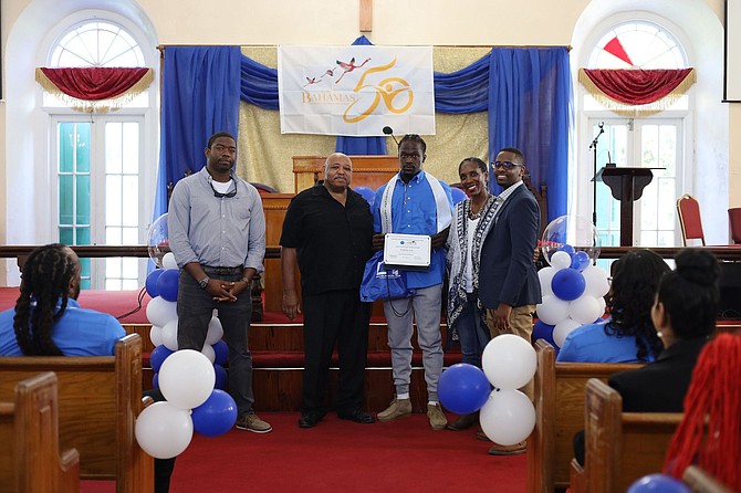 FROM LEFT: Darico Higgs, FHITS Board; Steve Galanis, CTI Electrical Installation Instructor; Fredrick Storr, Electrical Installation Course Graduate; Ithalia Johnson, Keynote Speaker; Keyron Smith, President and CEO, One Eleuthera Foundation & CTI.