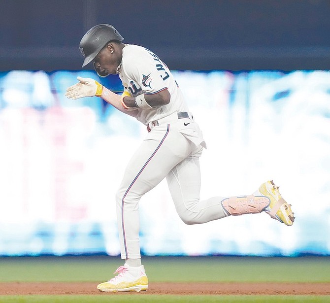 Miami Marlins’ Jasrado “Jazz” Chisholm Jr reacts after hitting a grand slam during the third inning of a baseball game against the Atlanta Braves on Sunday, September 17, 2023, in Miami. 
(AP Photo/Lynne Sladky)