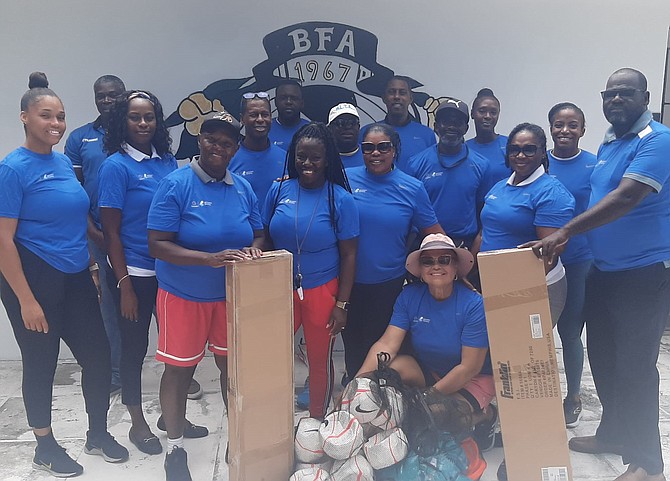 The Bahamas Football Association representative smake a presentation of soccer equipment ot primary school teachers.