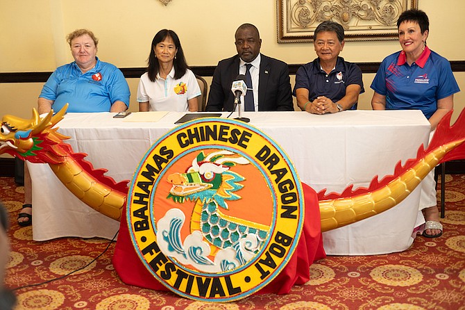 FASTEST GROWING SPORT: Seated, from left to right, are Bernadette Bryne, senior international Dragon Boat official in Pan American, Dr Christine Chin, president of Bahamas Chinese Dragon Boat Association, Minister of Youth, Sports and Culture  Mario Bowleg, Franco Siu Chong, president of Pan American Dragon Boat Federation and Meri Gibson, Global President of the International Breast Cancer Paddlers.