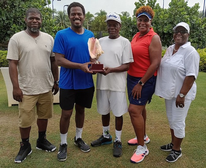 WE ARE THE CHAMPIONS: Shown, left to right, are Willis Rolle, men’s champions Marvin and Larry Rolle, Shena Bowleg and Dianne Rolle.