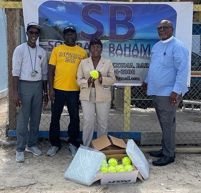 Softball Bahamas made a donation to Charles W Saunders School. Shown, from left to right, are athletic director Foster Dorsett,  Thomas Sears of Softball Bahamas, principal Anadel Thompson and senior master Stephen Duncombe.