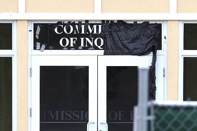 A SIGN reading Commission of Inquiry appears in a plaza on Bernard Road.
Photo: Dante Carrer