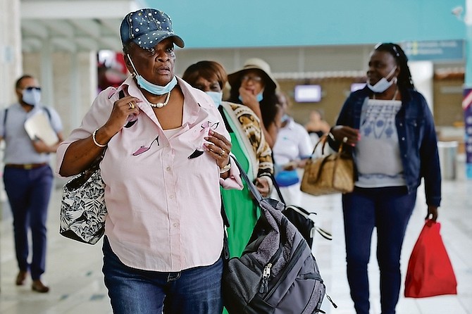 PATIENTS as they travel to Cuba for eye surgery from Lynden Pindling International Airport on Friday.
Photo: Dante Carrer