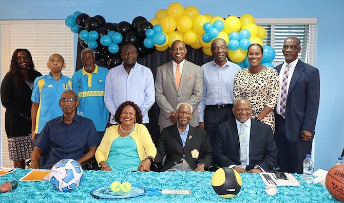 HALL OF FAMERS — Pictured seated from left to right are John Johnson, Jennifer Isaacs-Dotson, Fernley Palmer and Montez Williams of the Ministry of Sports. Standing in back from left are Oria Wood-Knowles, Lawrence ‘Larry’ Davis, James ‘Sam’ Brown, Minister Mario Bowleg, Anton Sealey, Craig Flowers, Kelsie Johnson-Sills, director of sports and consultant Harrison Thompson.                                                                                                                          Photo: Andrew Laroda